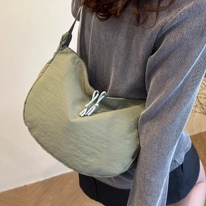 Minimalist green hobo bag for women with stylish dual knot zippers and nylon finish