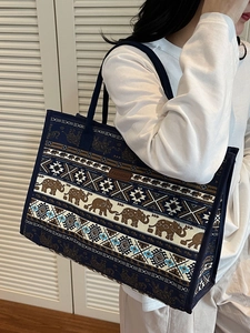 Vintage bohemian canvas tote bag with elephant pattern and spacious interior design