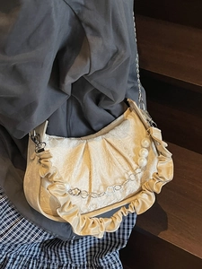 French chic beige pleated cloud bag with elegant pearl chain and silver metal hardware