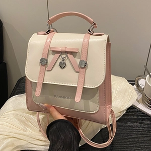 Petit sac à dos carré rose et blanc avec nœud et pendentif en métal pour femmes