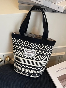 Ethnic style canvas bucket bag with geometric patterns and sturdy handles for women