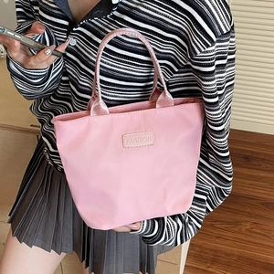 Pink waterproof nylon shoulder bag with Fashion label for daily casual use
