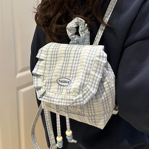 Blue plaid mini backpack with lace trim and ruffled edges for a sweet school girl look