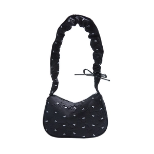 Chic black ballet style crescent bag with white bow prints and ruched shoulder strap