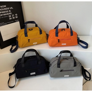 Four versatile nylon crossbody tote bags in yellow, orange, black and grey colors