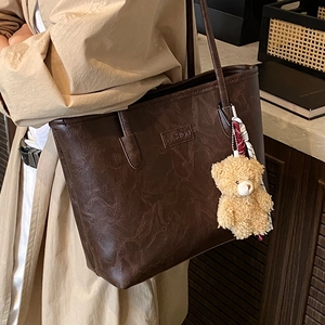 Retro dark brown large tote bag with bear charm pendant for casual commuting style