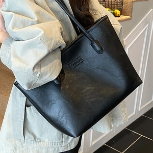 Classic large black PU leather tote bag with fashion embossing on simple shoulder straps