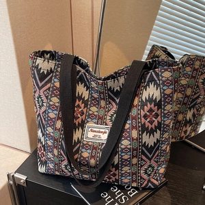 Ethnic style large capacity tote bag featuring geometric woven patterns and black straps