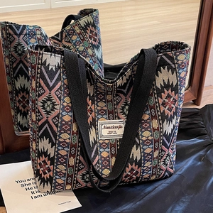 Ethnic style large capacity woven tote bag with colorful geometric patterns and handles