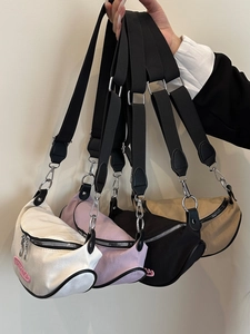 Lightweight crossbody chest bags in four colors with wide straps and pink embroidery