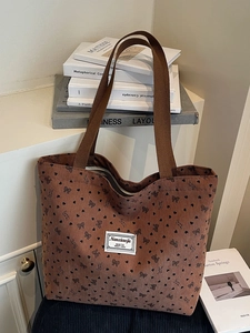 Brown corduroy tote bag with heart bow prints and top handles for large capacity daily use