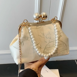 Chinese style silk handbag with bamboo print, large pearl clasp and gold chain strap