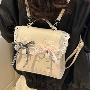 Sac à dos chic en simili cuir beige avec bordure en dentelle blanche et nœuds