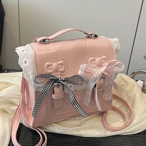 Sac à bandoulière rose style Lolita avec dentelle blanche et nœuds vichy