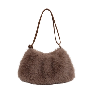 Brown faux fur bucket bag with leather strap for autumn winter commute style