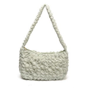 Chic light green popcorn textured crescent shoulder bag with pleated strap for summer