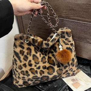 Leopard print faux fur tote bag with metal chain strap and pearl pompom accessory