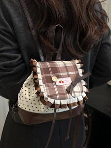 Japanese style cherry bow mini backpack with checkered trim and star pattern in coffee brown