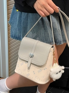 Chic beige and grey contrast crossbody bag with cute cat prints and heart buckle
