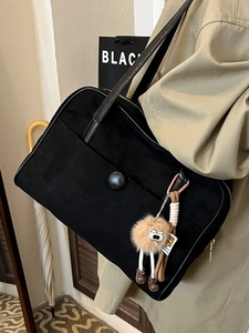 Retro black suede large shoulder bag for women with a cute plush monster pendant charm