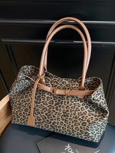 Large leopard print faux suede tote bag with brown leather straps and gold buckle detail