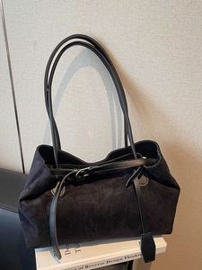 Large black suede tote bag with leather straps and silver buckle for minimalist daily commute