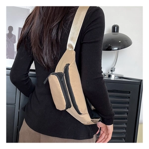 Close-up of waterproof Oxford cloth crossbody bag in khaki with adjustable strap