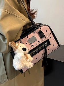 Pink and black polka dot shoulder bag with cute teddy bear charm for women