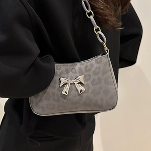 Gray leopard print shoulder bag with silver butterfly buckle and stylish chain strap