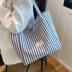 Large capacity tote bag with blue and white vertical stripes for casual daily commuting