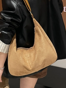 Retro frosted suede tote bag in tan hobo style with smooth zipper closure and wide strap