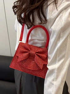 Elegante borsa da sera rossa con strass e maxi fiocco per cerimonie e look da damigella