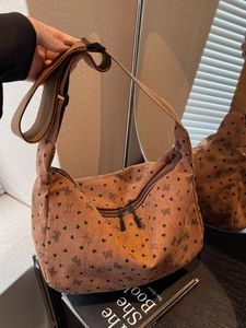 Brown corduroy crossbody bag with sweet love heart prints and wide shoulder strap