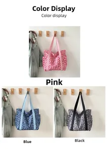 Detailed color display of leopard print tote bags in pink, blue, and black fabric