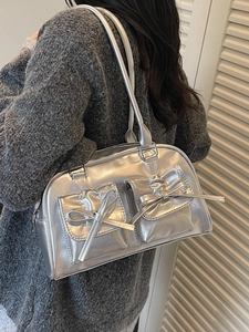 Chic silver PU leather shoulder bag with decorative bows and twin pockets for women