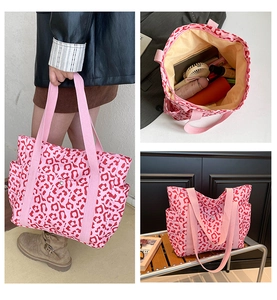 Pink leopard print canvas tote bag detail showing large capacity and side pocket storage