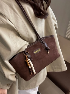 Retro brown suede tote bag with wooden bead charm and fashion label for women