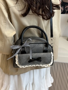 Chic grey bow handbag with white lace trim and black ribbon detail for women