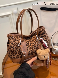 Retro leopard print suede bucket bag with leather handles and cute bear charm