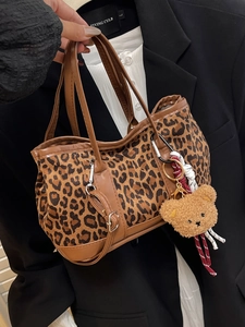 Retro leopard print handbag with plush bear charm and adjustable strap for women