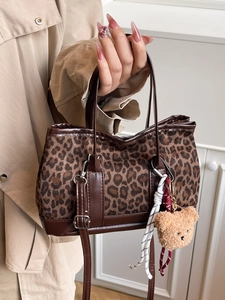 Retro leopard print suede bucket bag with brown leather trim and cute bear charm