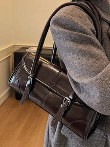 Vintage dark brown glossy leather underarm bag for women with silver buckle details