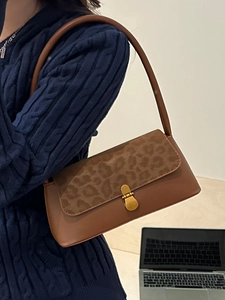 Vintage leopard print shoulder bag with brown leather and gold clasp for office commute