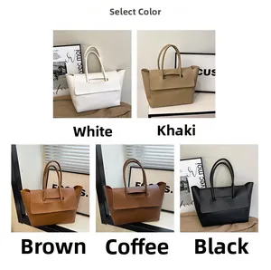 Detalle de cinco colores de bolsos tote minimalistas con acabado mate y cierre de solapa
