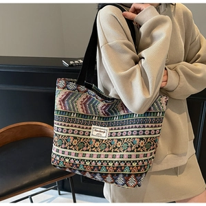 Close-up of ethnic jacquard pattern and texture on a large capacity tote bag