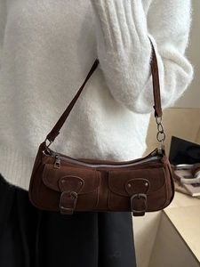 Brown suede baguette shoulder bag with double pockets and silver metal buckle accents