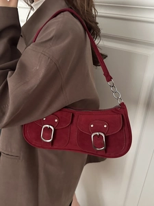 Vintage burgundy suede underarm bag with double front pockets and metal chain strap
