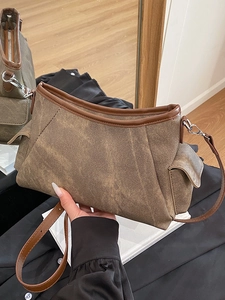 Retro brown canvas underarm bag with leather trim and adjustable shoulder strap
