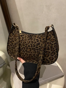 Fashionable leopard print crescent underarm bag with vintage suede finish and gold zipper