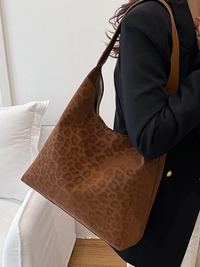 Elegant leopard print hobo shoulder bag for women made of soft brown suede material